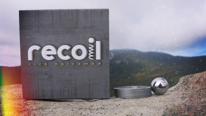 recoil with ball and slinky spring
